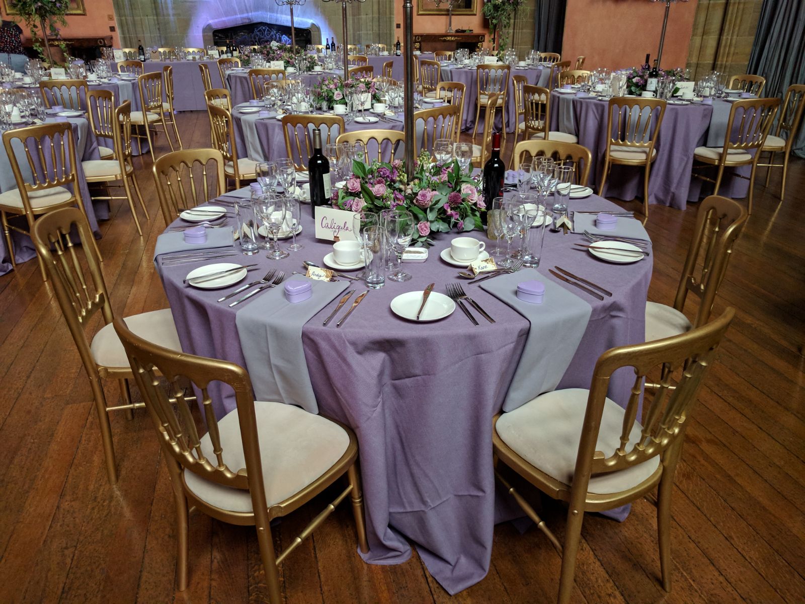 gold cheltnam chairs and 5ft round table at cowdray house