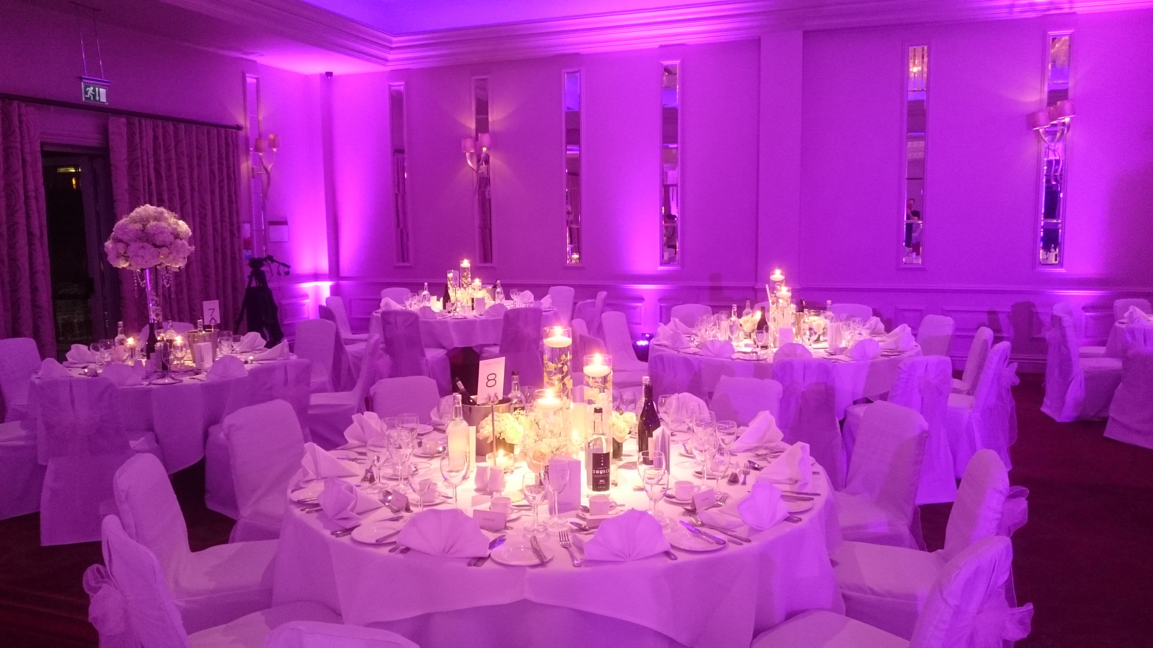 pink uplighters and table decorations